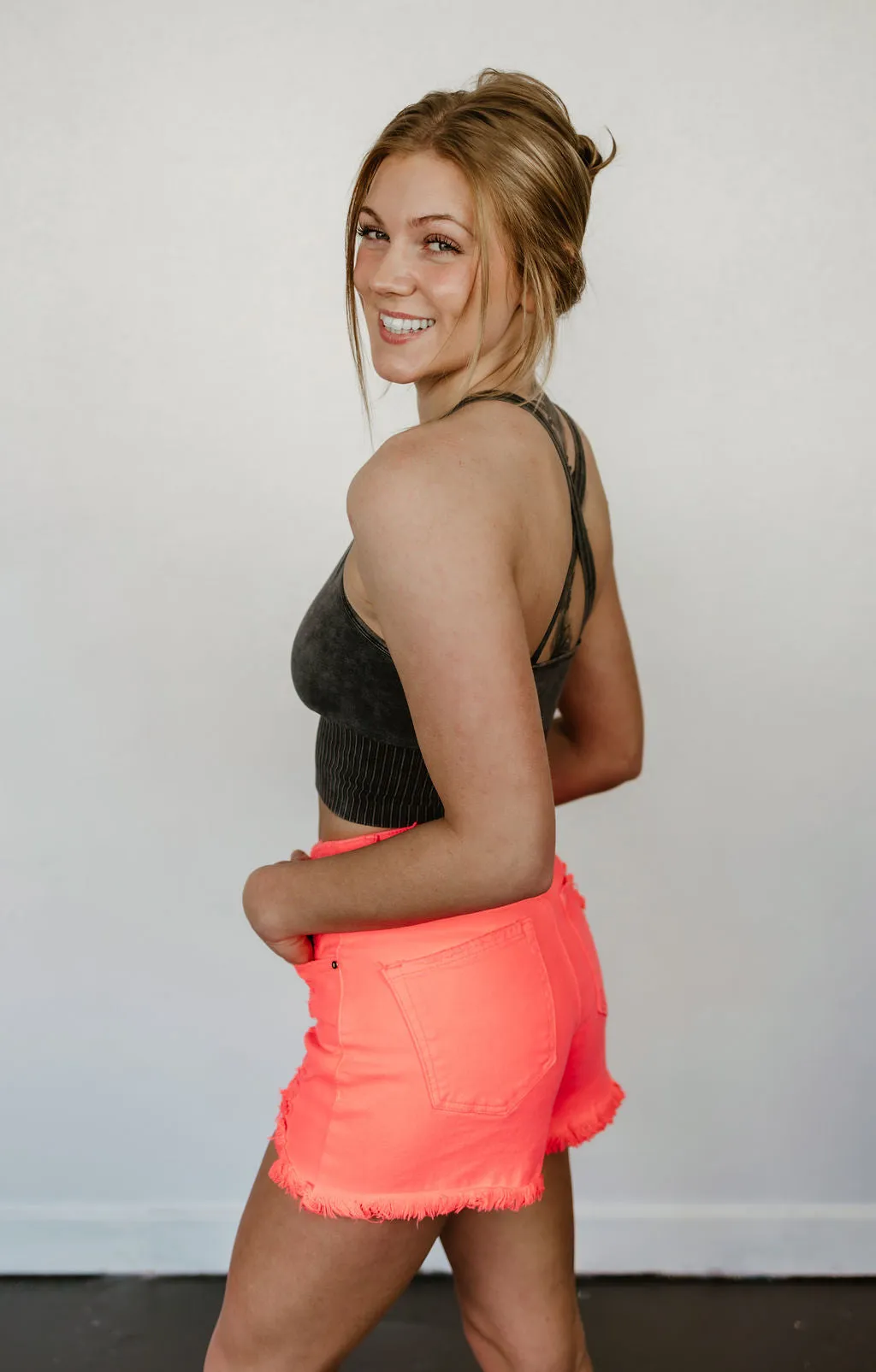 Statement High Rise Distressed Risen Shorts in Coral